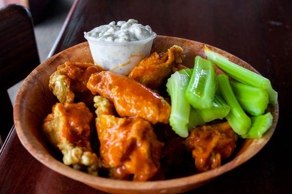 Wings served fresh daily with out famous blue cheese dressing.