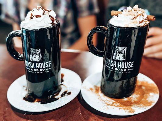 Fancy coffee drinks, mint mocha (left) and cinnamon roll (right). The cool mugs are $16 and are made lopsided looking on purpose ;)