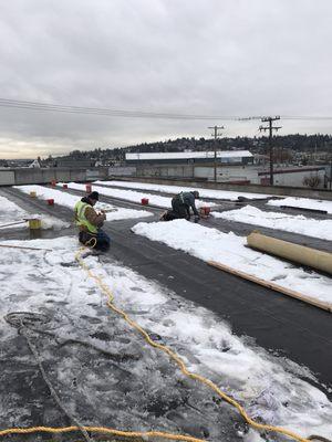 Roof repairs after snow storm