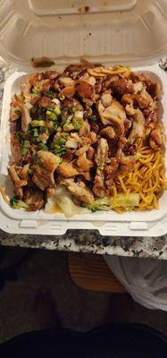 Chicken combo with noodles and vegetables.