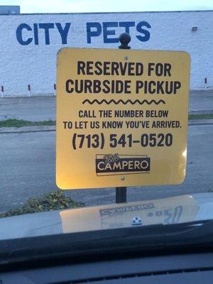 Despite the signage, there was no curbside pickup service.