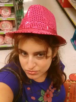 Me and my poor attempt at looking sexy in a sequined pink fedora hat.