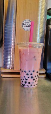 Raspberry milk tea with boba pearls