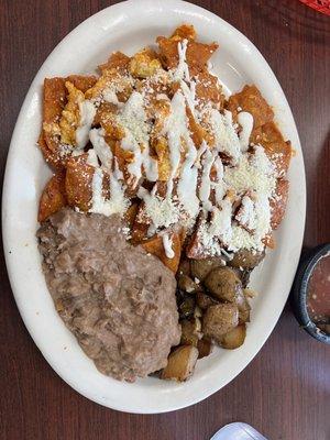 Chilaquiles w/scrambled eggs, beans & potatoes