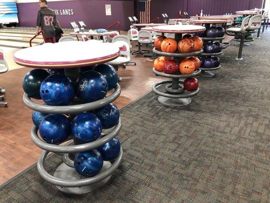 The bowling balls are very well organized by weight.