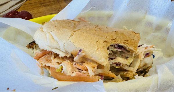 Blackened fish Po'Boy sandwich ( half of the sandwich minus a bite). I was too excited to take the photo first.