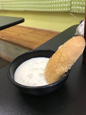 New England Clam Chowder with a breadstick. Delicious!