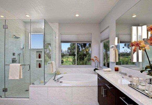 Shower enclosure and mirrors installed in this award winning bathroom