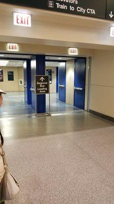 The one sign on the opposite side of the baggage claim from the old pick-up location.