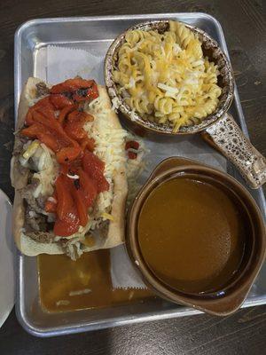 Smoked Italian beef with sweet peppers and au jus with a side of Mac & cheese