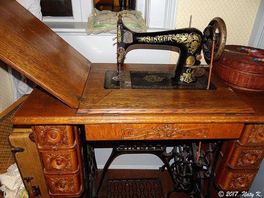 A sewing machine of the time period.