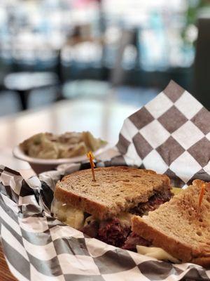 New York, NY: corned beef, pastrami, Swiss, sauerkraut, Russian dressing, on rye bread. Don't underestimate the potato salad. YUM. June 2018