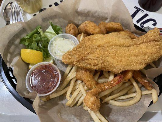 Catfish, prawns and fries with hush puppies