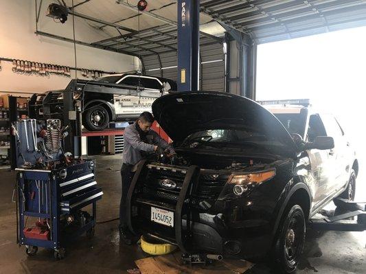 Servicing Azusa Police vehicles.