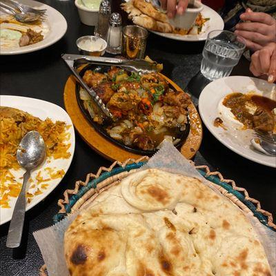 Crispy naan, mixed grill, tandoori wings. Very much recommend this location.