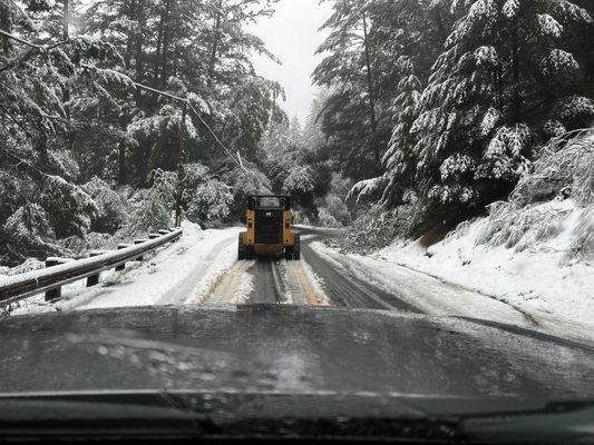 Following the mighty yellow tractor to the recovery zone