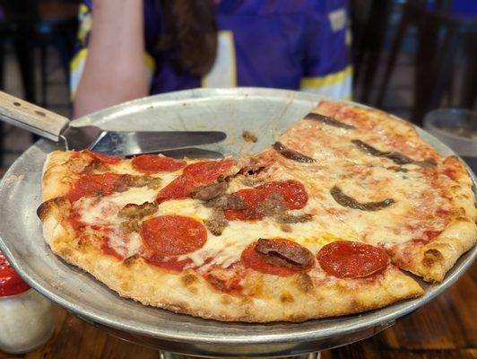 Build-A-Pizza  1/2 anchovies and cheese, the other 1/2 pepperoni, Italian sausage, and extra cheese