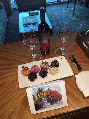 Amenity - chocolate dipped strawberries and an amazing red!