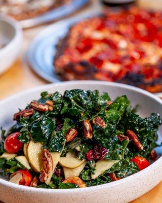 Tuscan Kale Salad - Massaged kale, Bose pear, sweetened cranberries, tomato confit candied pecans with white balsamic