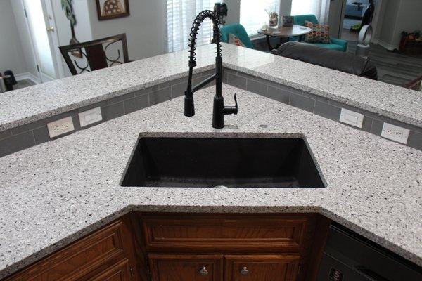 Pearl Gray Quartz with 3x6 Desert Gray subway tile.