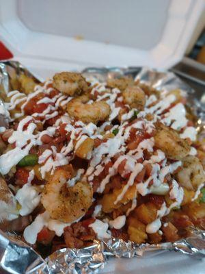 Taco salad with shrimp at it