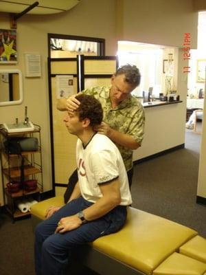 Michael DeMarco World Class Swimmer getting checked in our office