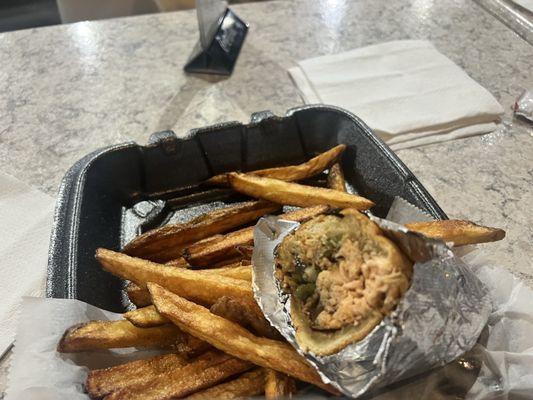 Salmon jerk sandwich and fries