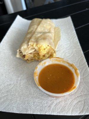 Bacon breakfast burrito with salsa