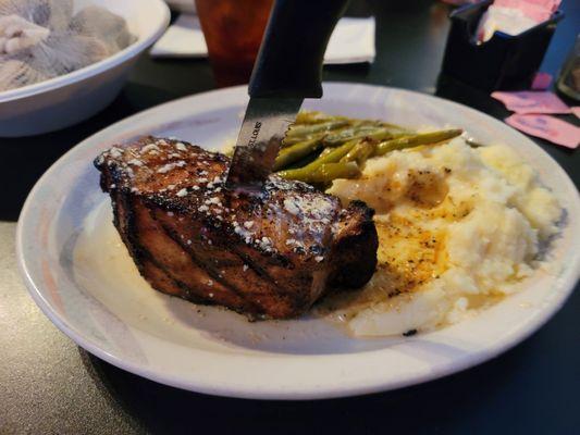 Porkchop, Garlic Mash Potatoes, and fresh green beans.