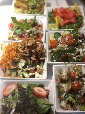 Fatoush, Tabouli,Garbanzo,Cranberry spinach, pasta feta cheese and Falafel Salads