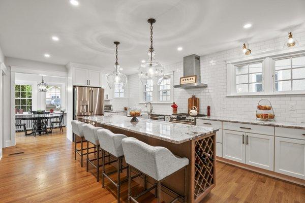 Kitchen remodeling. Large island with seating. White shaker cabinets. White subway tile backsplash. Countertop installation. Philadelphia,PA