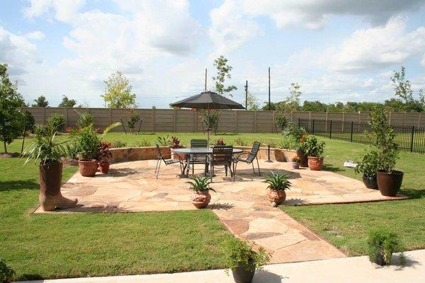 Stone patio and walkway at Del Webb Sweetgrass residence in Richmond, Texas