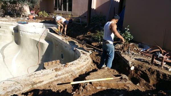 Trenching for plumbing.