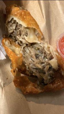 Eggroll (chicken & shrimp) is what the cashier stated, but it looks like trash and smells AWFUL.