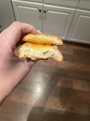 This heel of bread and sliver of cheese is what you get with Newk's grilled cheese sandwich.