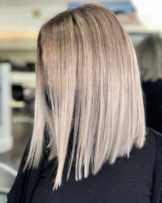 Titanium blonde highlight and cut by Carla