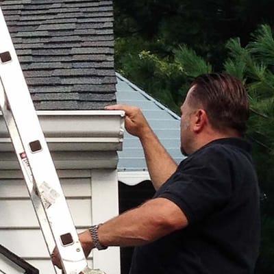 Cleveland home inspector Jay Brzezinski inspecting a home furnace.