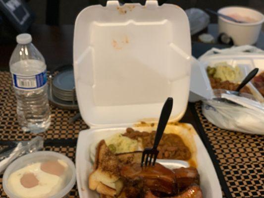 Plate order: 4 ribs, baked beans, potato salad, slice of toast, and some onions, pickles and jalapeños. On the side is banana pudding.