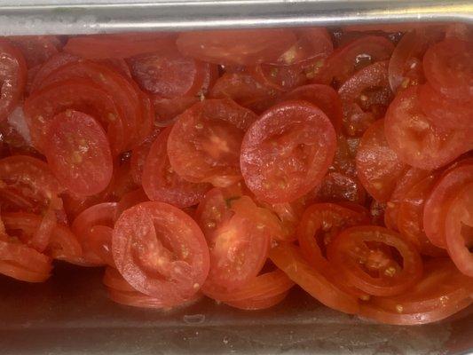 Tomatoes looks previously frozen.