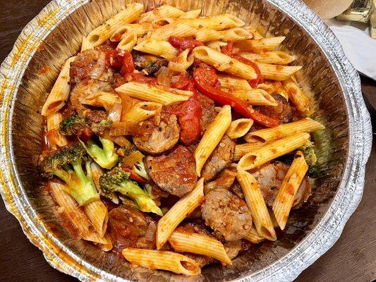 Hot sausage and broccoli pasta (lunch)-sautéed hot sausage, hot pepper flakes, roasted red peppers in a tomato sauce