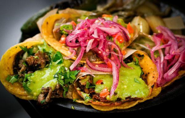 Tacos with pickled habanero red onion