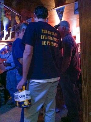 Chugging beer & dancing to cajun music at 9am - what's not to like?! BTW - read the dude's T-shirt.....