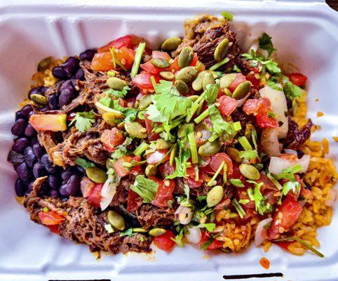 beef barbacoa bowl over rice - ingredients very fresh and flavorful