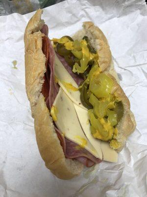 Italian B.M.T. with pepper jack cheese, pickles, jalapeños, pepperoncinis, and mustard - Delicious