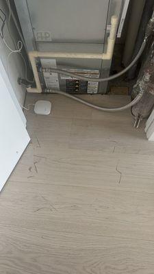 Scratched floor from poor installation job.