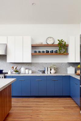 Beautiful Open Kitchen with lots of room for the family and guests. Features skylight windows with natural light, island, and more.