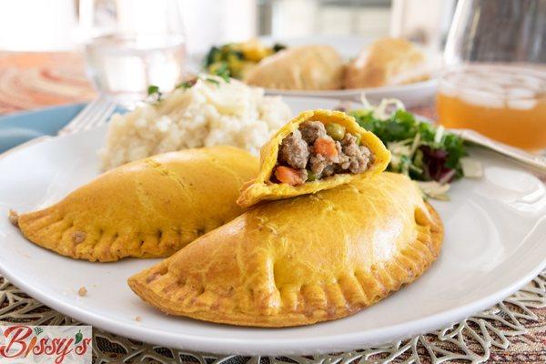 Curry Meatpie paired with a side of mashed potatoes