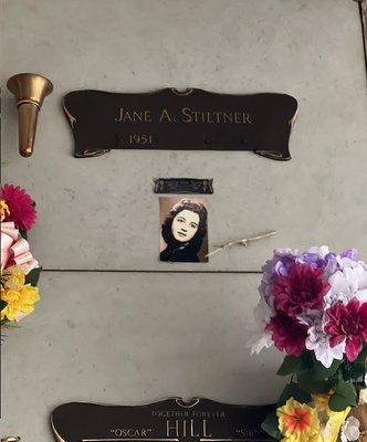 Mom died in Jan 2021. Now, in 2023, the only thing marking her entombment is a photo and paper copy of her plaque that I taped to the niche.