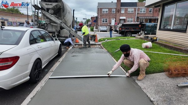 NYC DOT Sidewalk Violation Removal Demolition of existing old concrete. Installed welded wire mesh and pour out 4000PSI ready mix concrete.