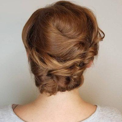 Formal occasion updo by Marissa  at the First Street location of Nuovo Salons in Sarasota, FL.